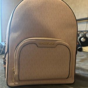 Light pink MK backpack